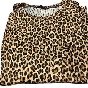 Try! This size 2X awesome leopard top cute pocket on right side great condition